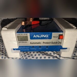 NIB, Anjing Aj618e,automatic protect quick charger, 220vac input/12-24vcd output